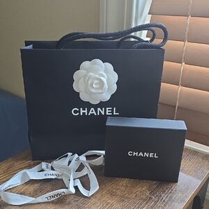 Chanel Bag And Boxes And Ribbon